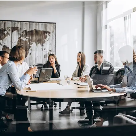 Cross-sector leaders meeting around a table