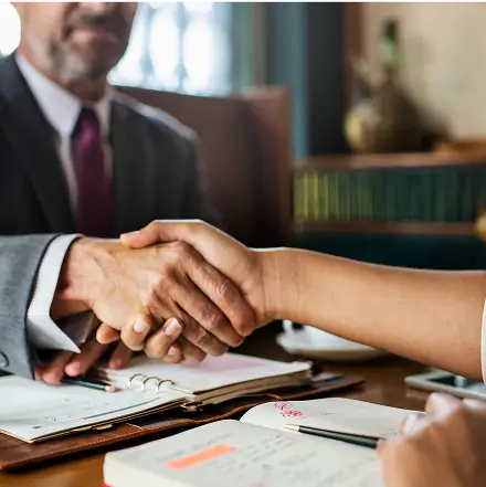 A handshake representing partnership